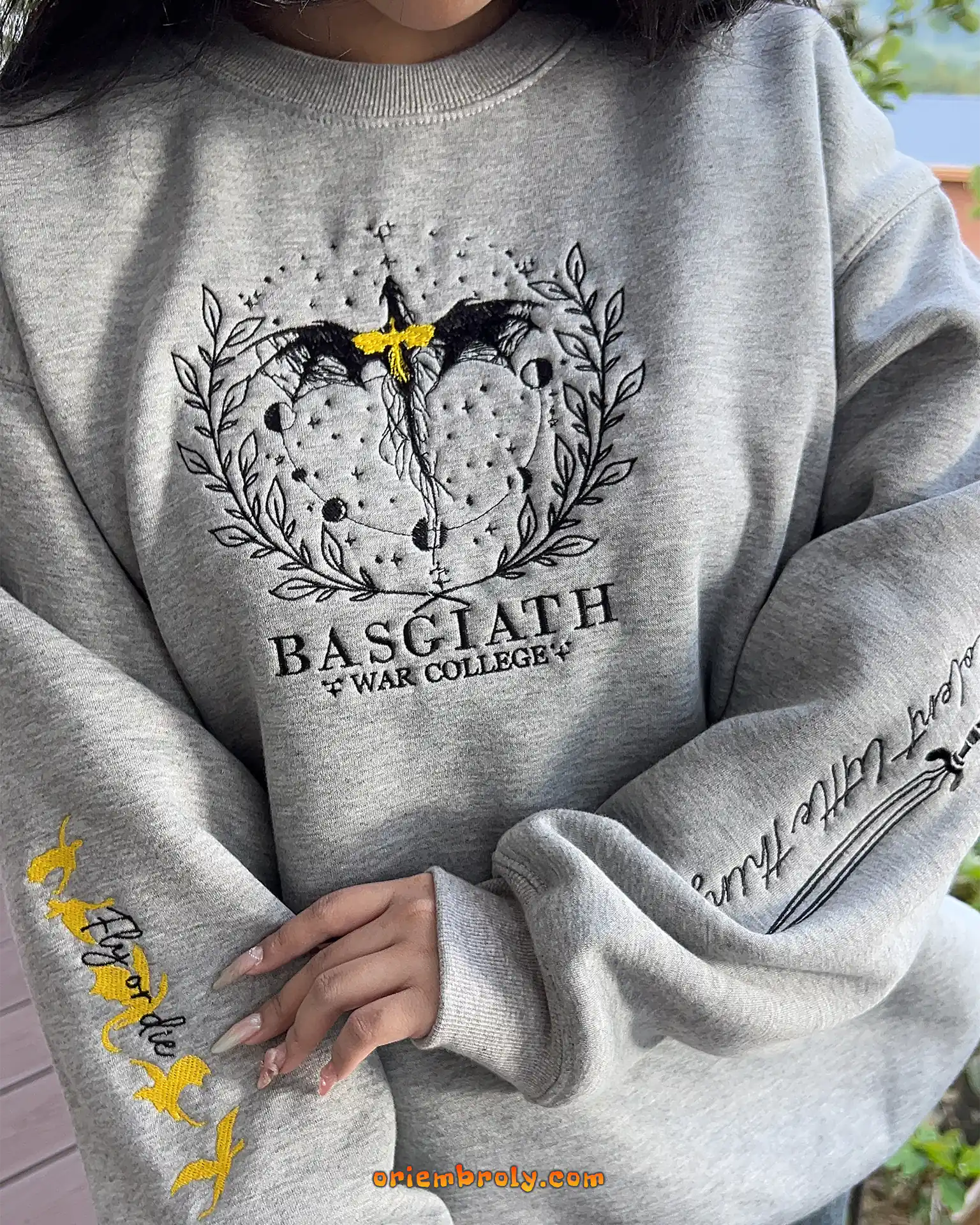 Textured embroidery detail on bookish fan crewneck
