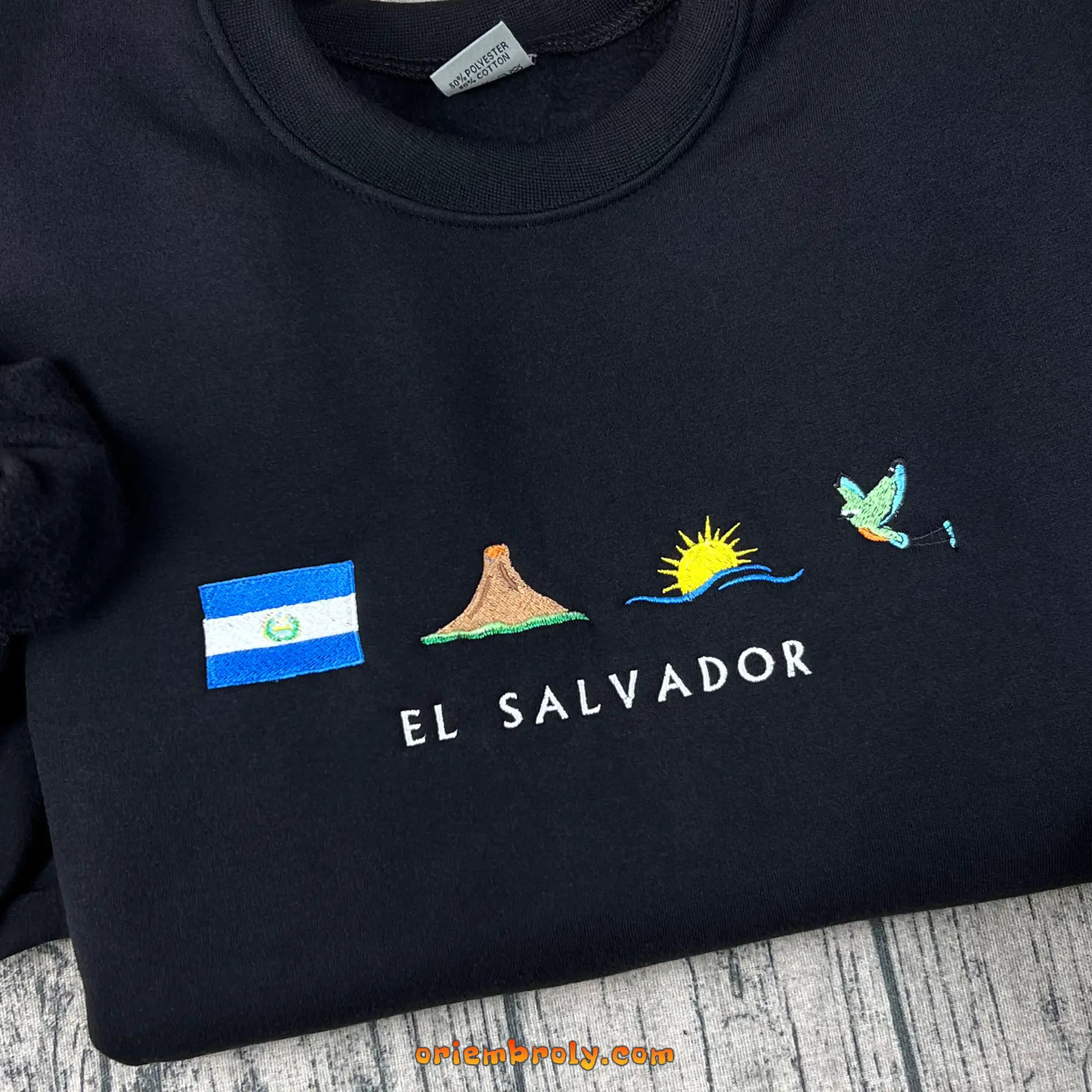 Four-icon embroidery featuring volcano beach and torogoz bird