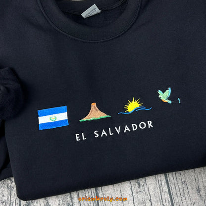 Four-icon embroidery featuring volcano beach and torogoz bird