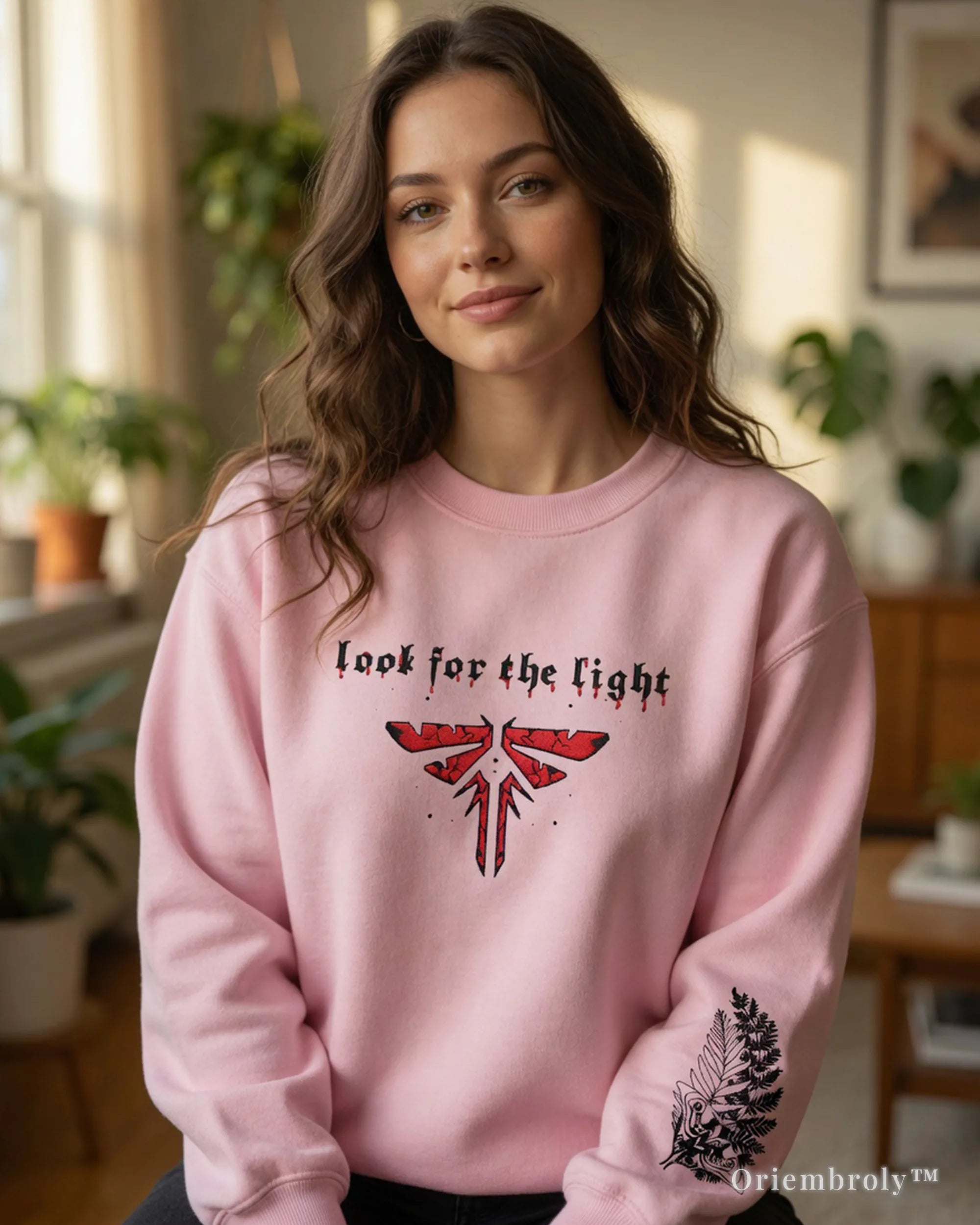 Ellie tattoo embroidered sweatshirt sleeve detail