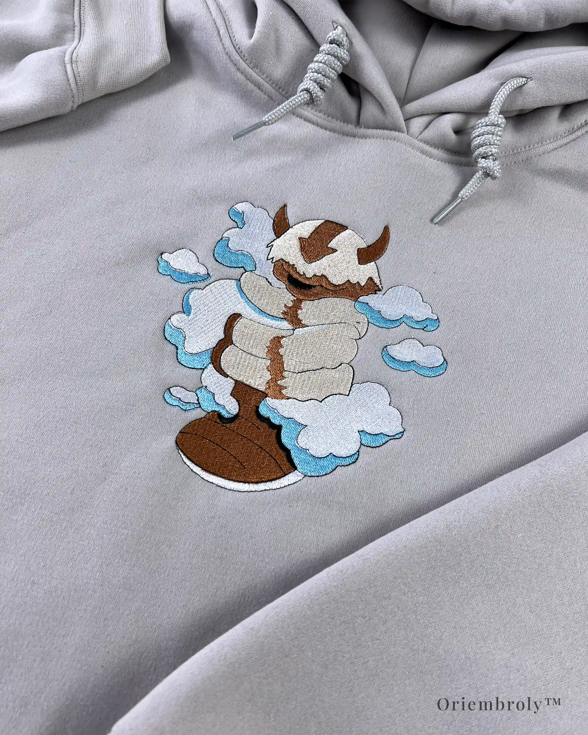 close up flying bison embroidery on hoodie chest