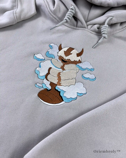 close up flying bison embroidery on hoodie chest