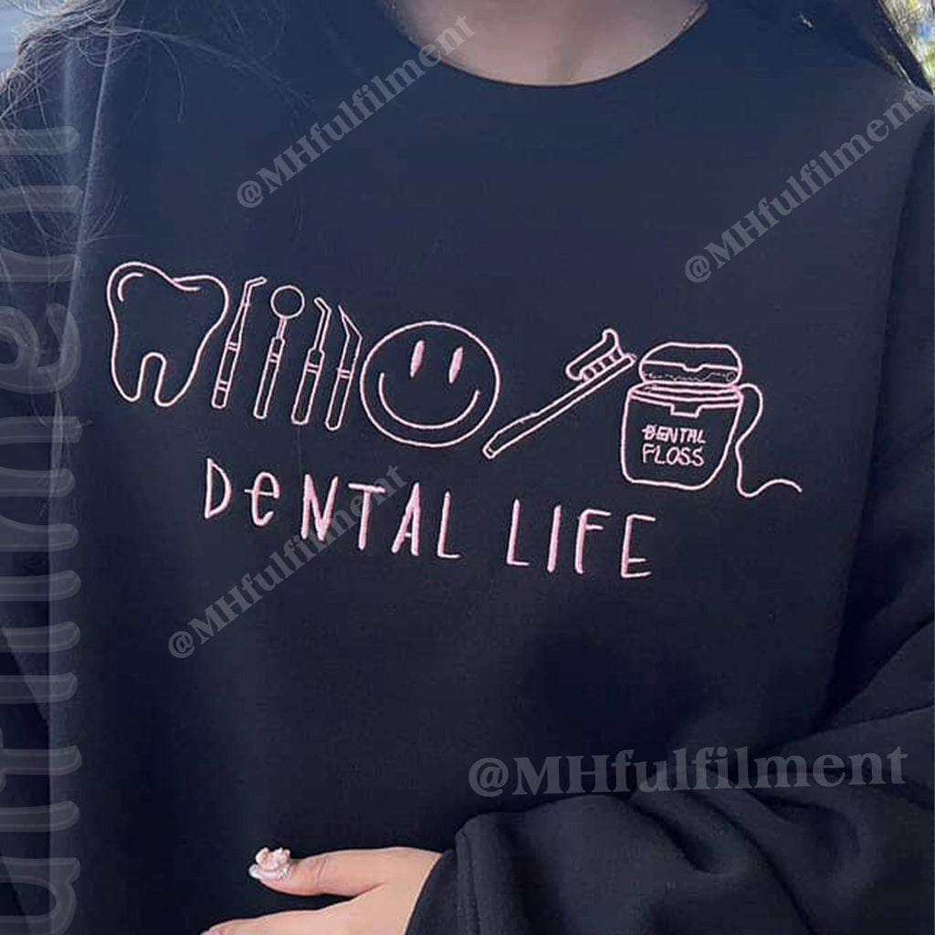 Orthodontic and pediatric dental team crewneck with Dental Life stitched design