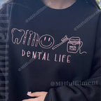 Orthodontic and pediatric dental team crewneck with Dental Life stitched design