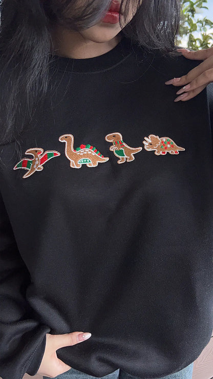Fun Christmas sweatshirt featuring a playful dinosaur design