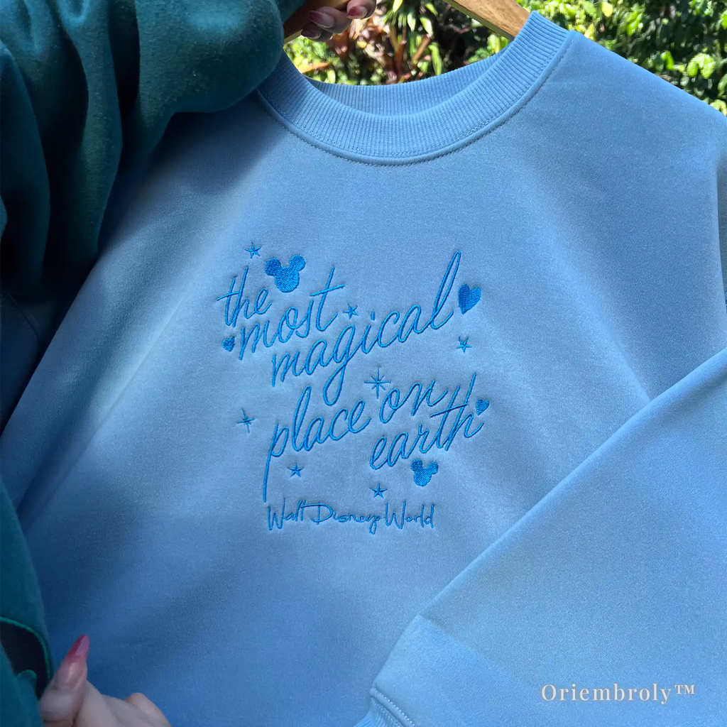 High-quality embroidered Disney Mickey Mouse sweatshirt in pastel blue color.