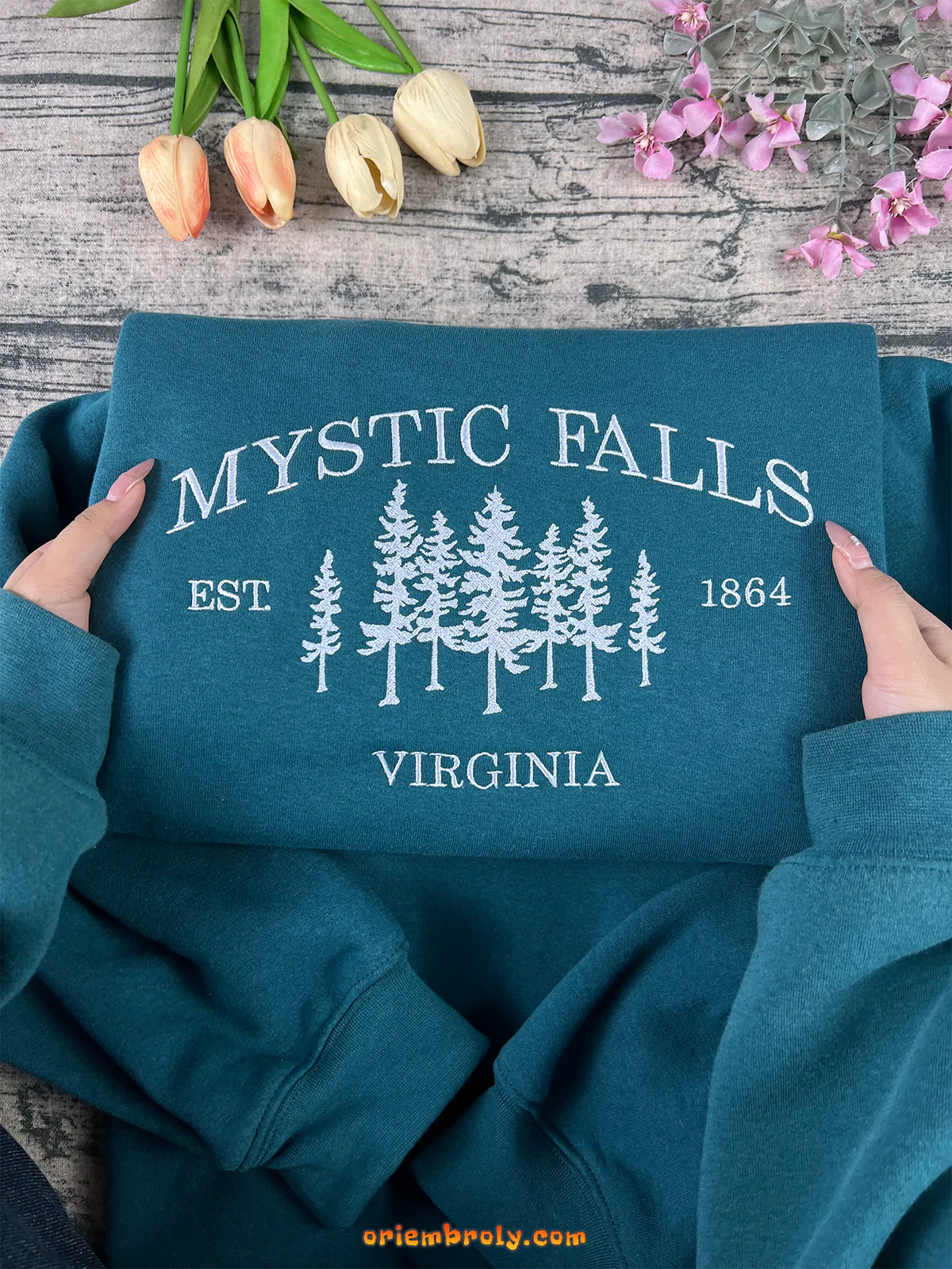 Teal tree embroidery on classic Virginia sweater