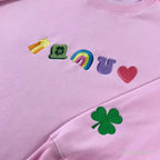 colorful marshmallow style embroidery on pink crewneck sweatshirt