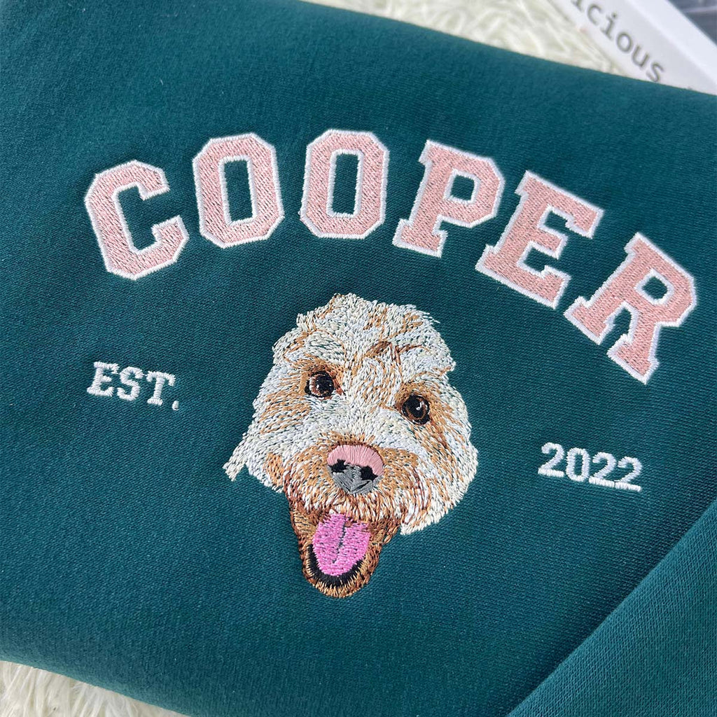 Matching pet and owner sweatshirts with custom pet embroidery.