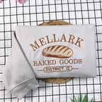 Hunger Games inspired embroidered Mellark sweatshirt, Abanathy Liquors shirt design, ideal bookish fan gift.