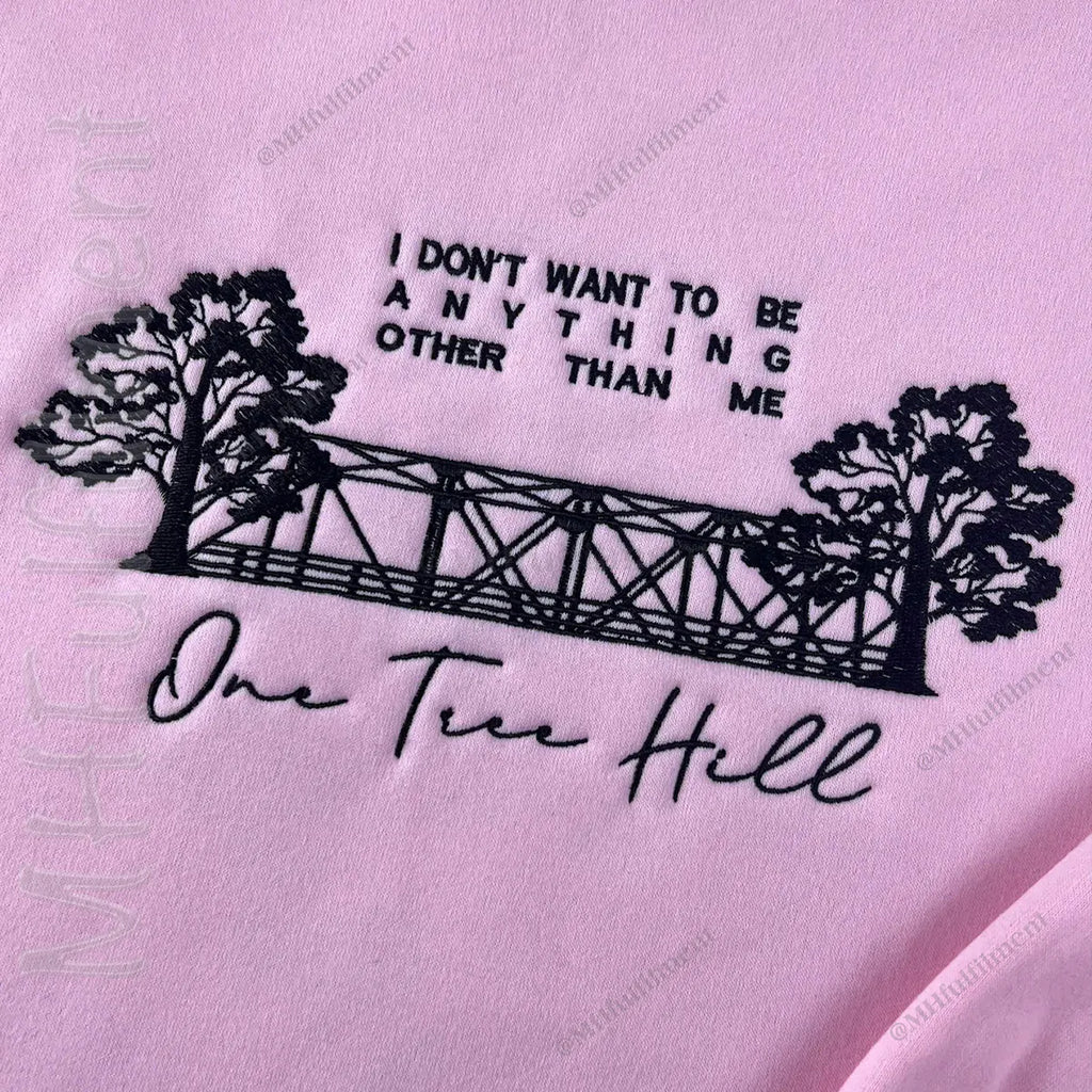 Girl wearing Tree Hill Ravens hoodie outdoors