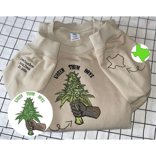 Custom embroidered hoodie featuring a detailed picture embroidery.