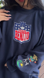 Model satin stitch embroidery on Team Benito crewneck