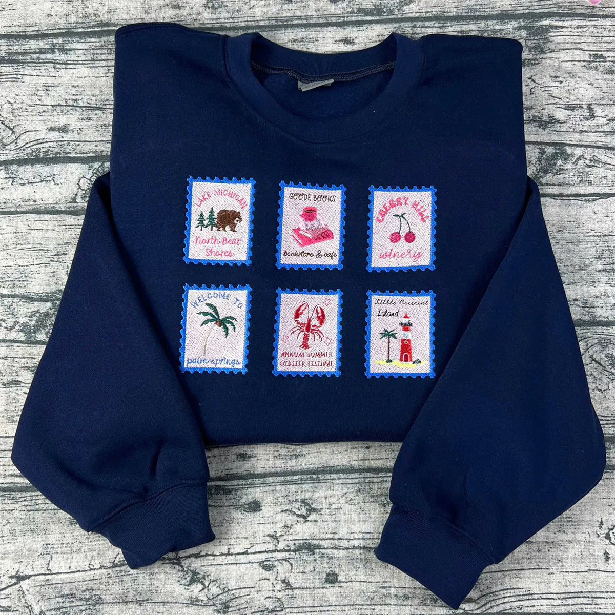 Emily Henry book-themed embroidered sweatshirt with stamp designs