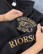Fantasy-inspired embroidered quarter zip for book lovers