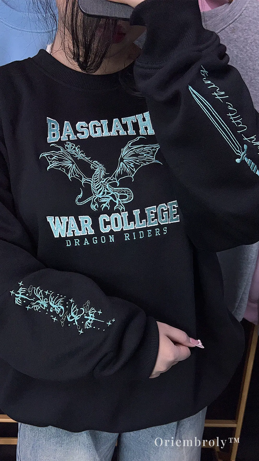 model wearing fantasy dragon embroidered crewneck