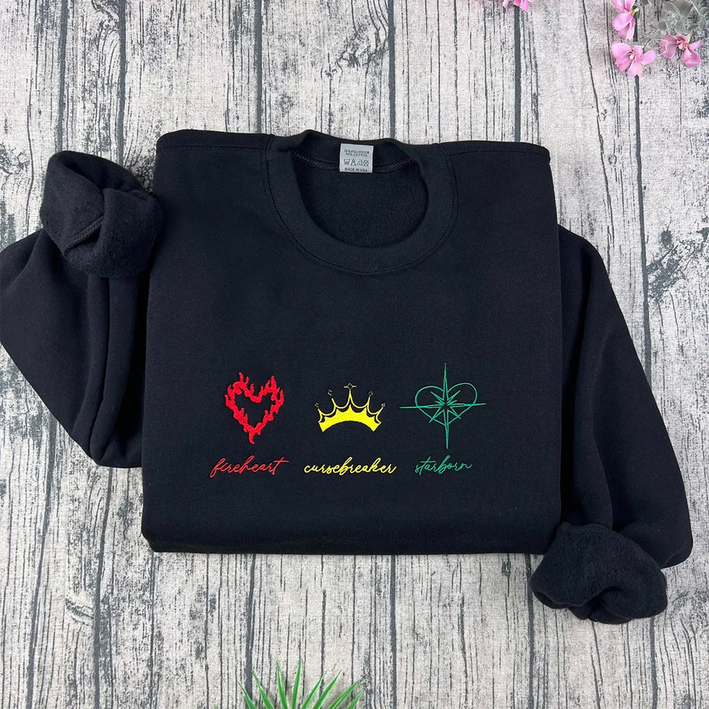 Fireheart embroidered sweatshirt from Throne of Glass featuring Empire of Storms and Heir of Fire designs. Perfect gift for book lovers.