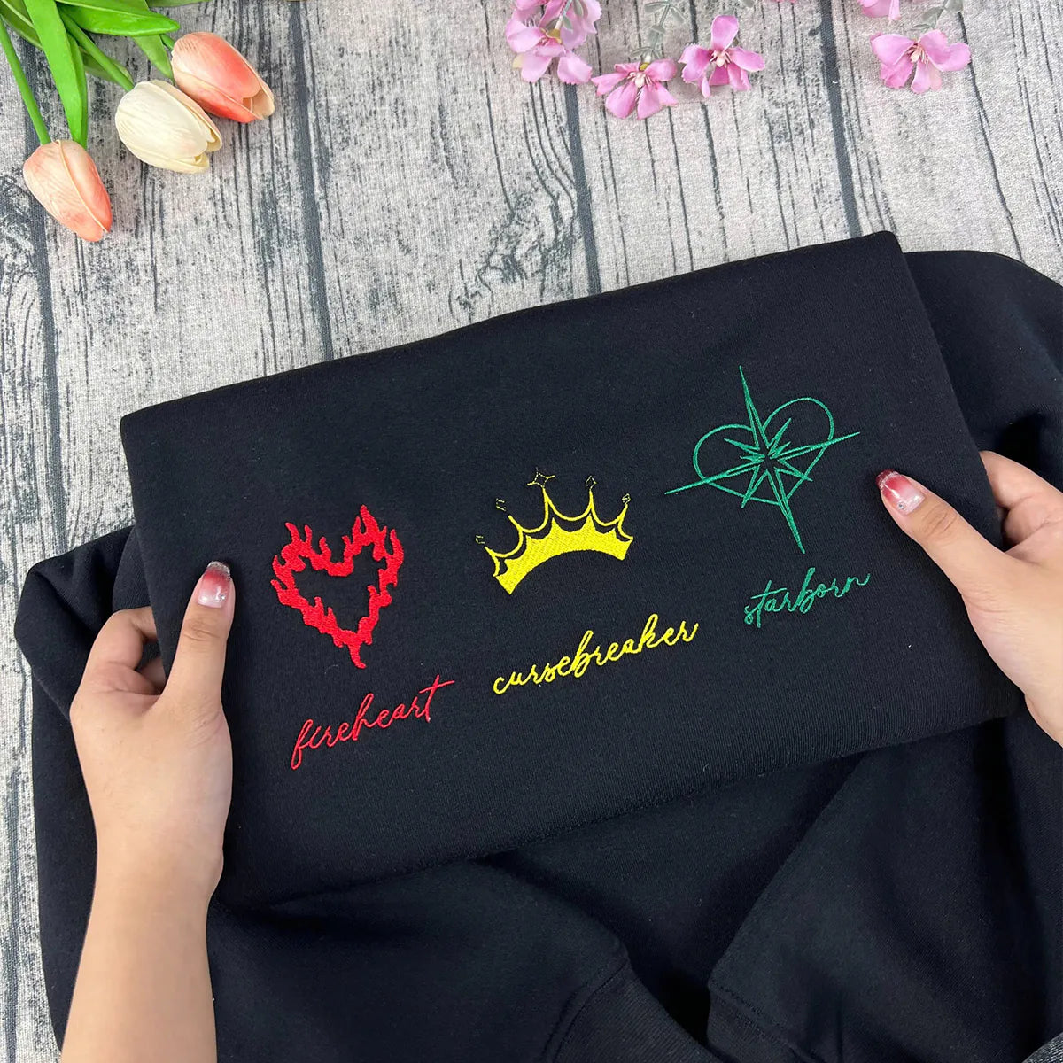 Throne of Glass Fireheart embroidered sweatshirt with Empire of Storms and Heir of Fire artwork. Ideal for fans of the series.
