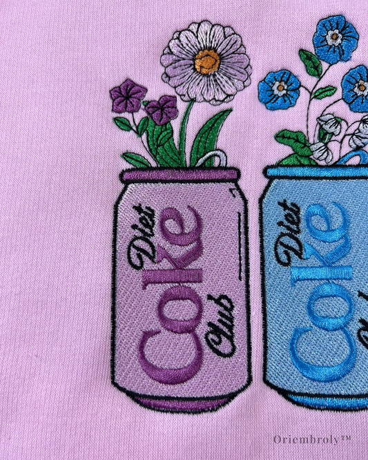 Close-up floral soda can embroidery on crewneck