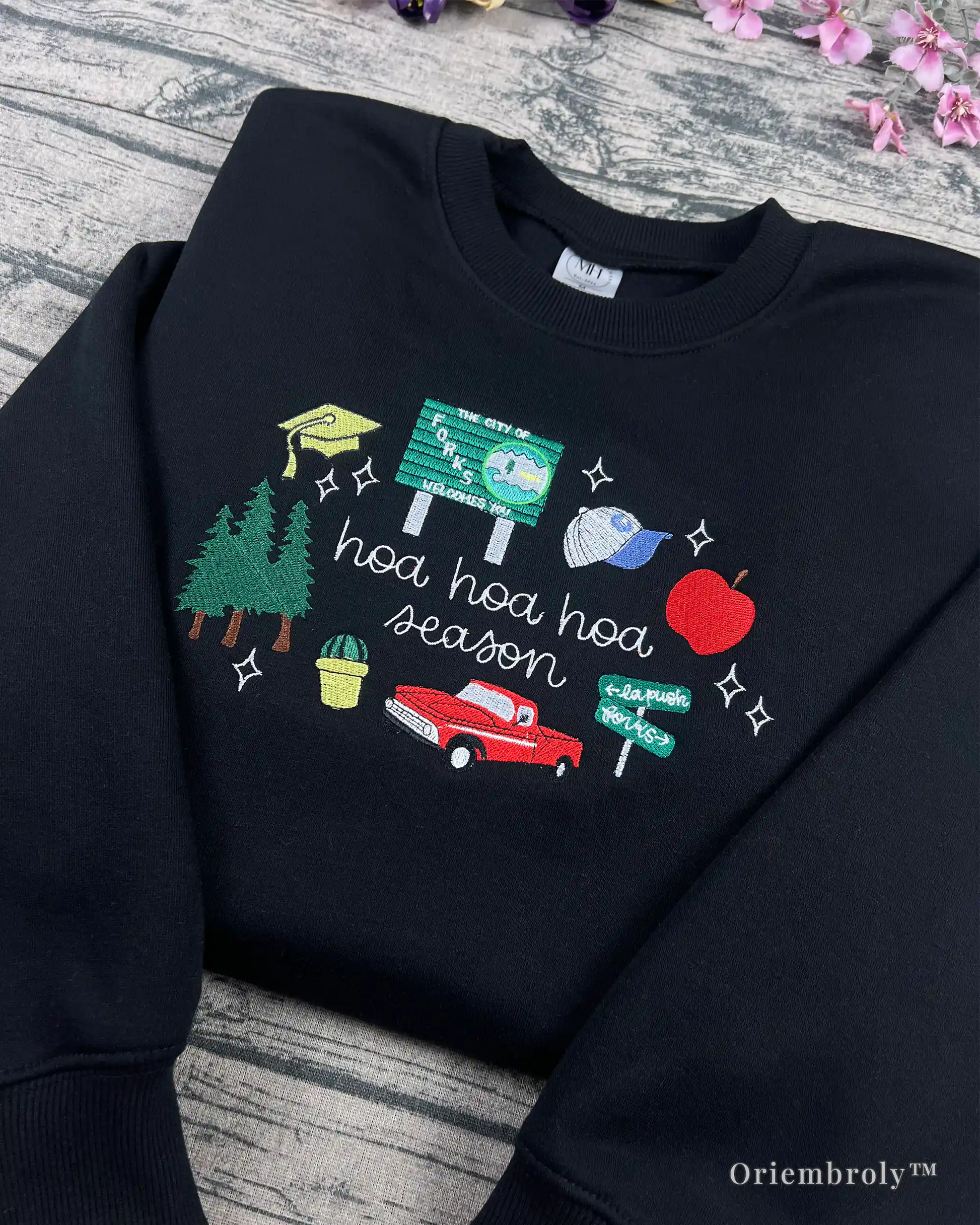 Forks inspired embroidered sweatshirt with symbolic icons