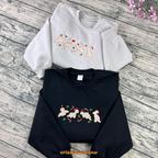Gingerbread cake-inspired dinosaur embroidered sweater