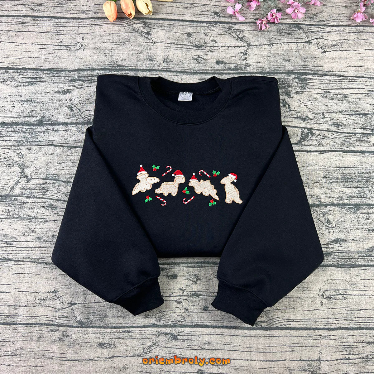 Embroidered gingerbread dinosaur cookie Christmas sweatshirt