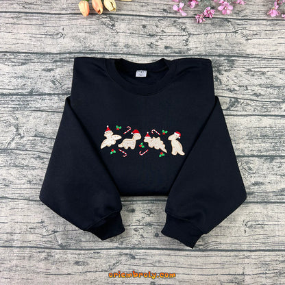 Embroidered gingerbread dinosaur cookie Christmas sweatshirt