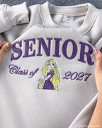 Embroidered graduation sweatshirt with princess-inspired artwork