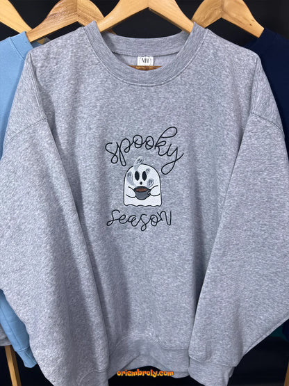 Unisex grey Halloween hoodie with spooky design