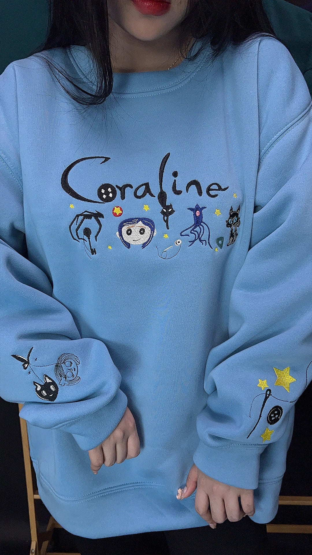 Unisex embroidered hoodie with Halloween cartoon scary doll design