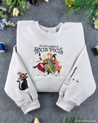 Halloween embroidered crewneck sweatshirt with vintage witch-inspired chest design.