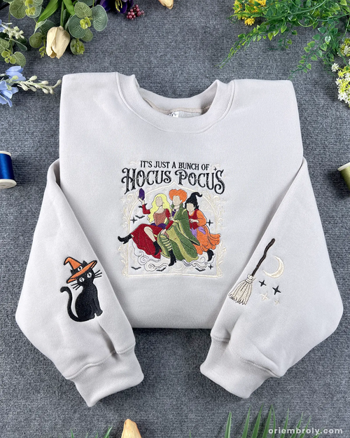 Halloween embroidered crewneck sweatshirt with vintage witch-inspired chest design.