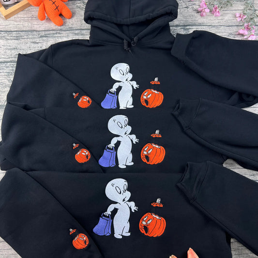 Halloween pumpkin embroidered sweatshirt in cozy orange, perfect for spooky season and autumn outfits.