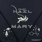 Close-up of a heavyweight black sweatshirt with premium white satin-stitched astronaut and "Project Hail Mary" title. Durable, high-density thread work designed for a premium, textured finish and long-lasting wear