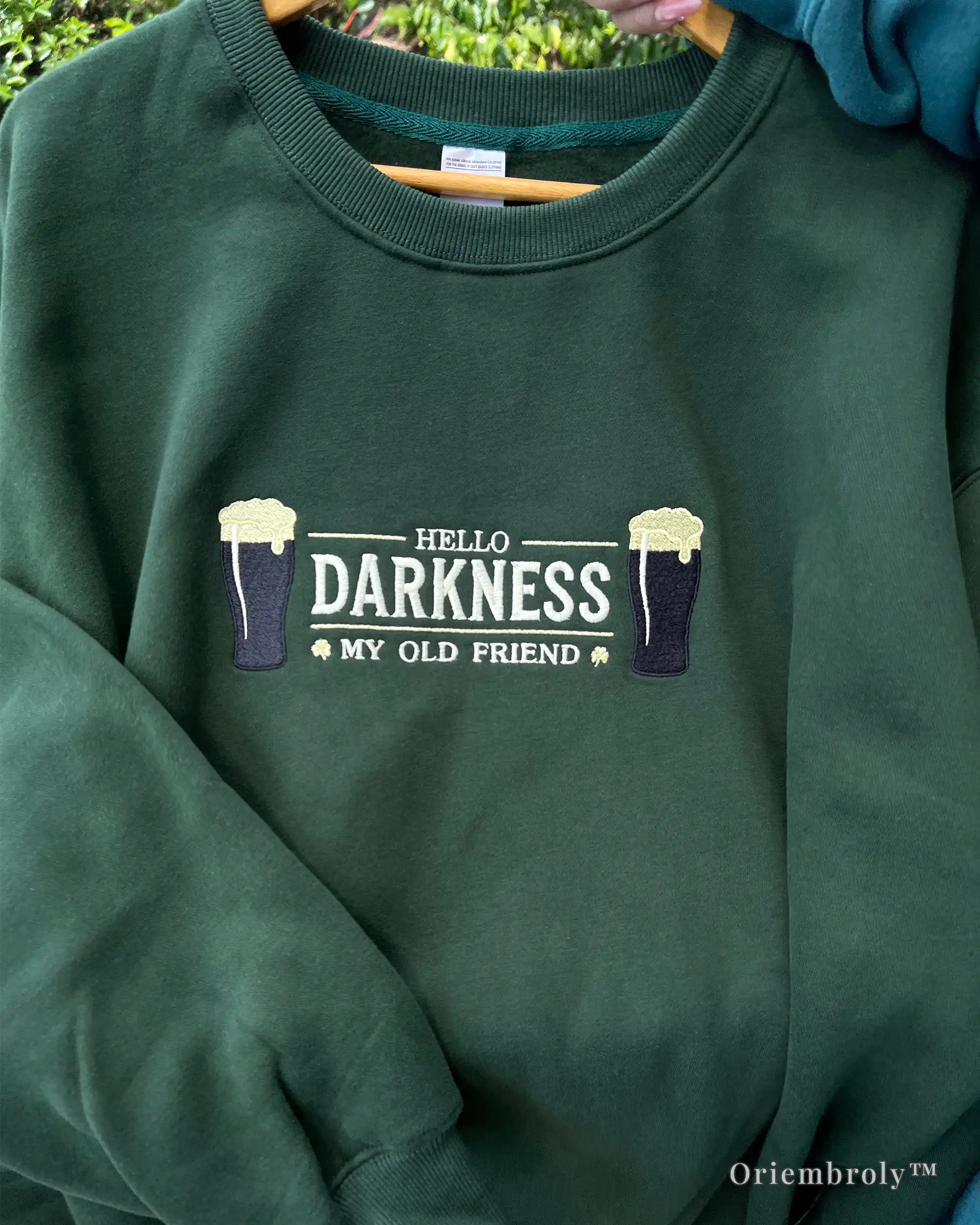 embroidered Hello Darkness My Old Friend crewneck flat lay