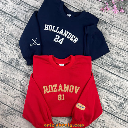 White embroidered hockey name and number crewneck