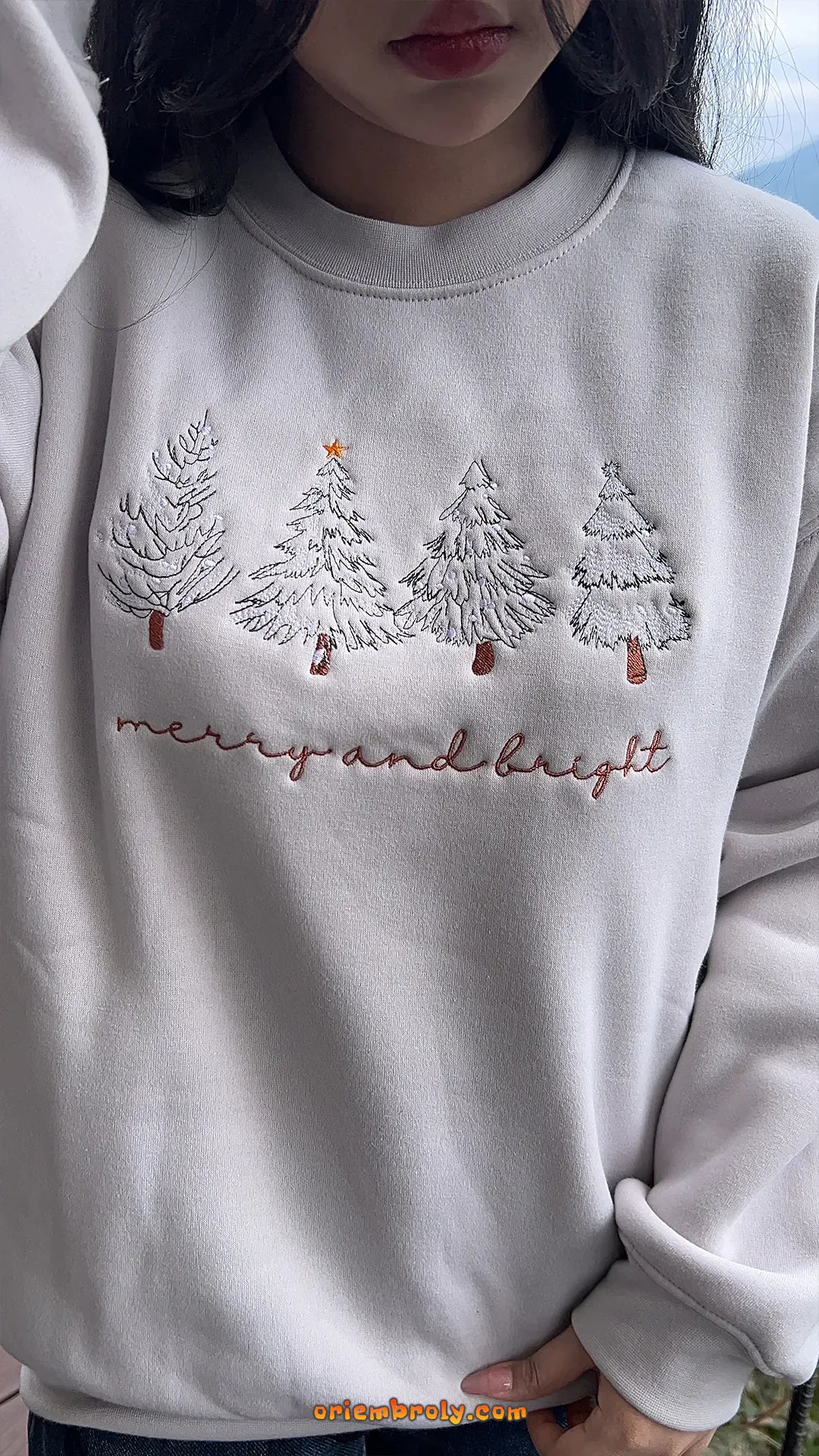 Festive embroidered tree sweater for winter season