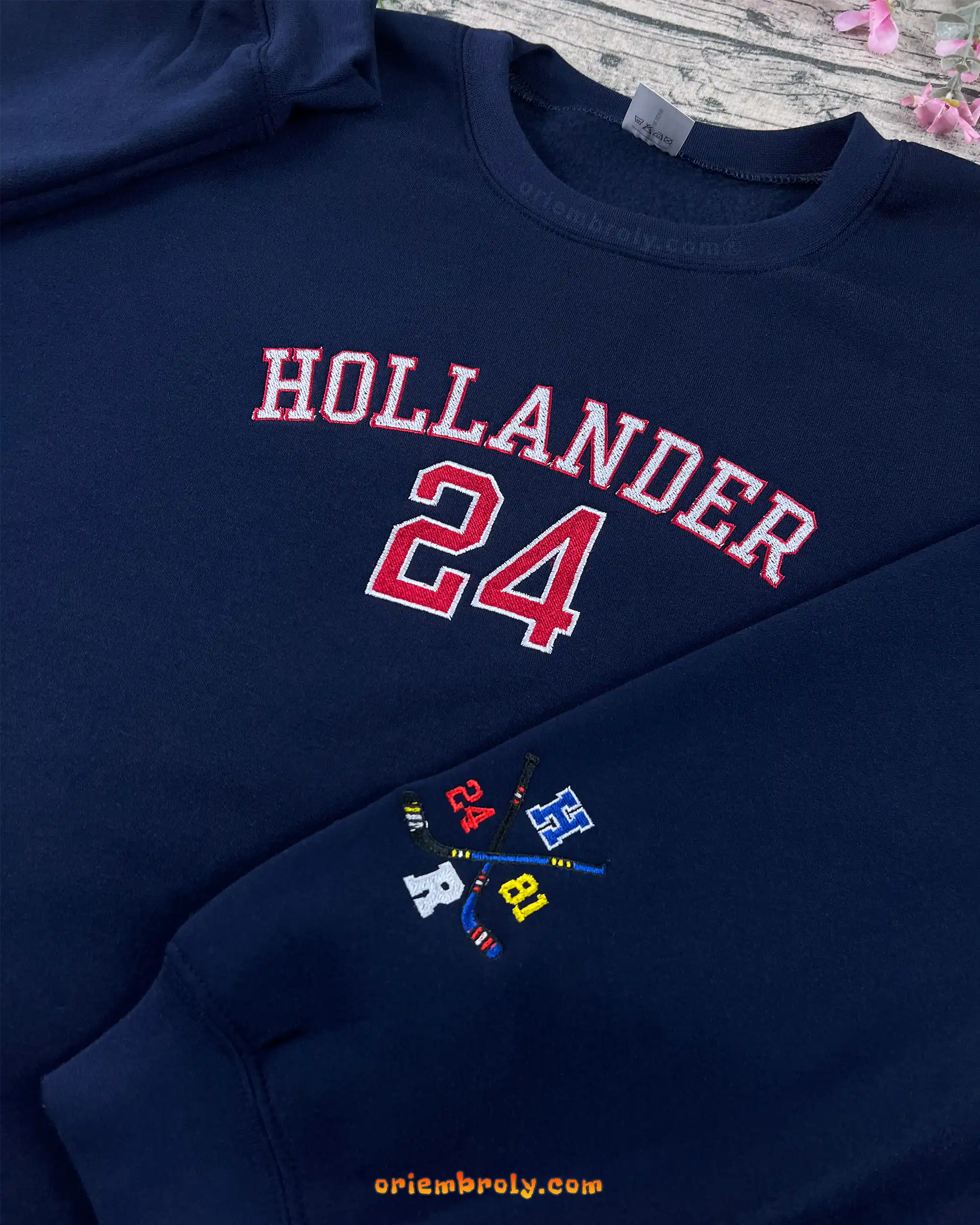 Textured multi-colored hockey embroidery on crewneck