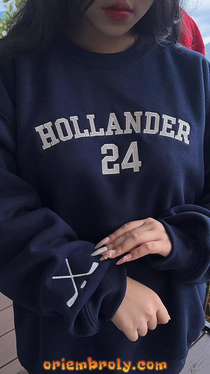 Hockey stick embroidery detail on Hollander 24 sweatshirt