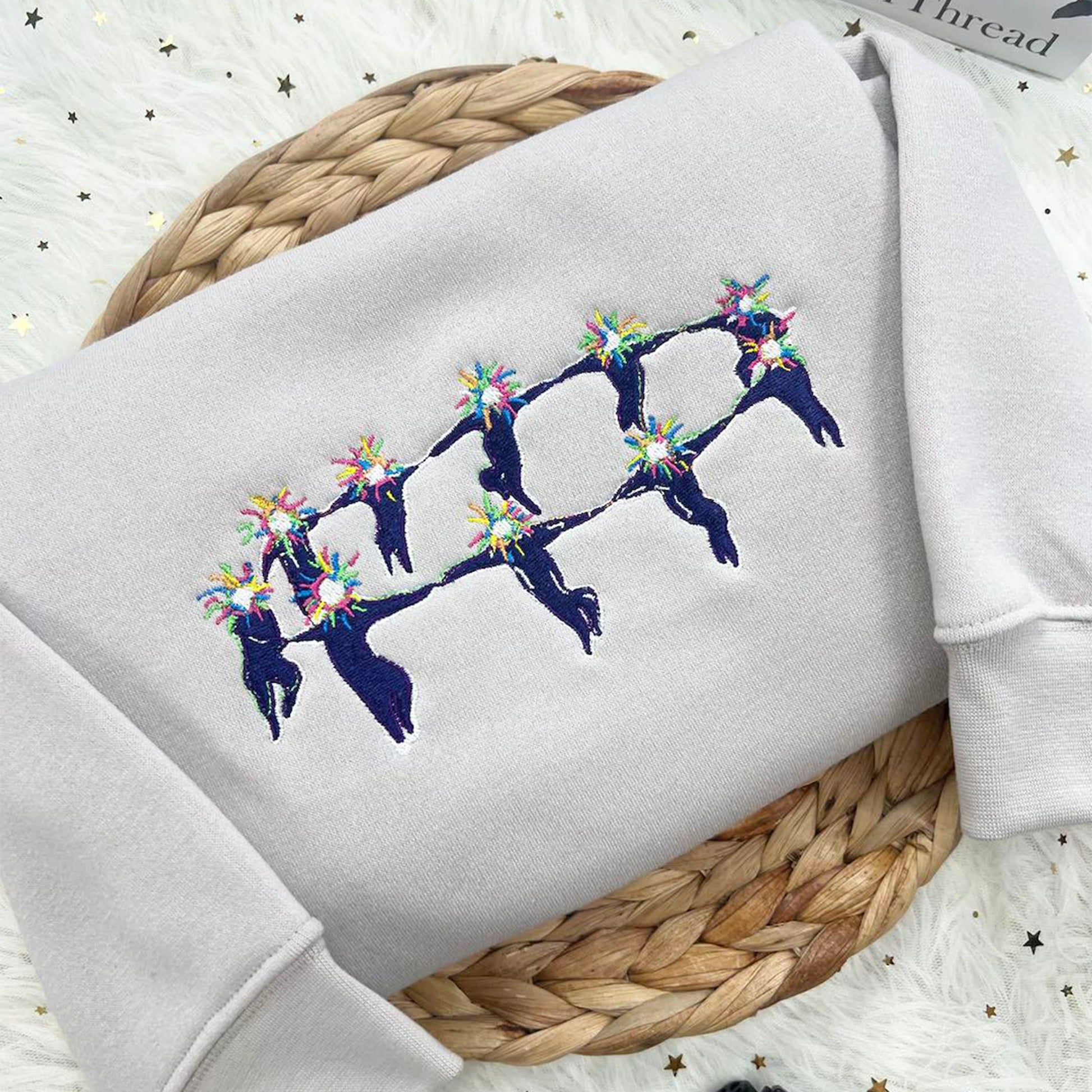 Howl's Moving Castle embroidered crewneck sweater featuring high-quality anime embroidery, perfect gift for Ghibli fans.