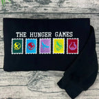 Embroidered Hunger Games sweatshirt with May The Odds Be Ever In Your Favor