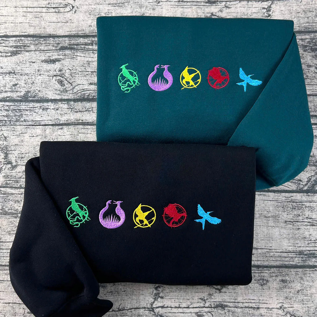 Hunger Games embroidered sweatshirt with Katniss design