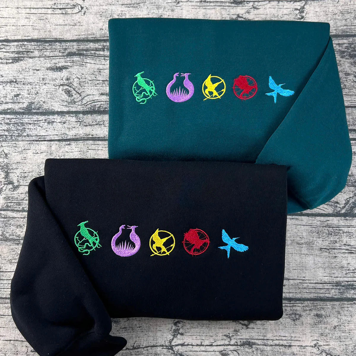 Hunger Games embroidered sweatshirt with Katniss design