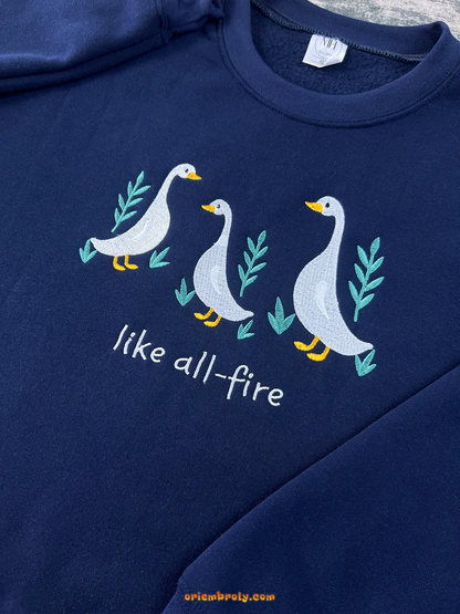 Cute goose crewneck hoodie with sunrise on the Reaping design
