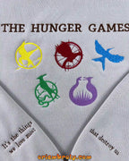 Close-up of symbolic embroidery inspired by Hunger Games