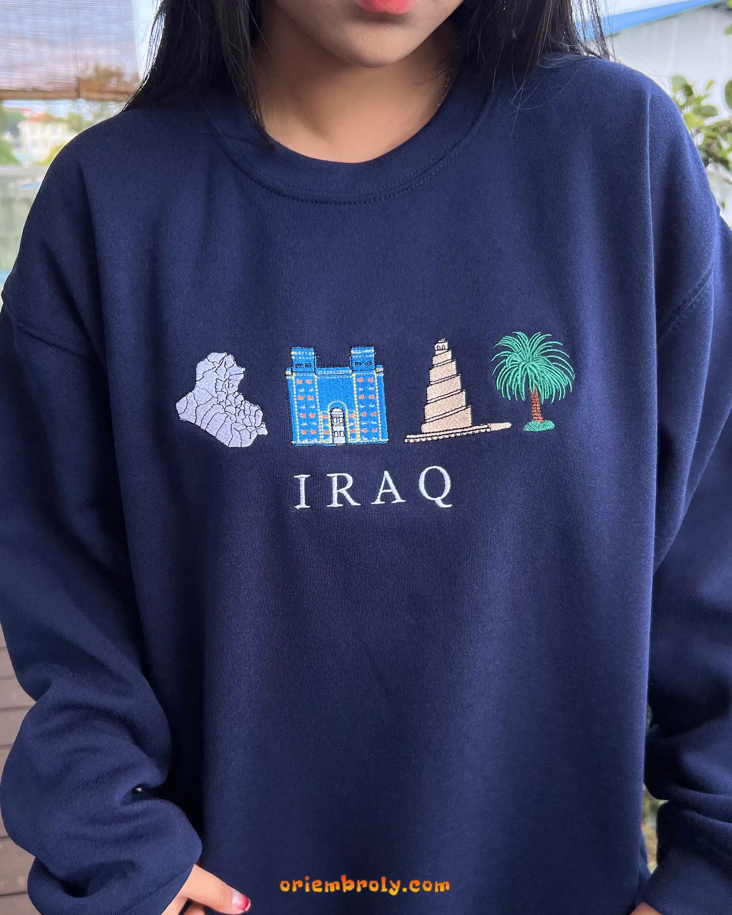 Iraq cultural icons embroidered on cotton-blend sweatshirt