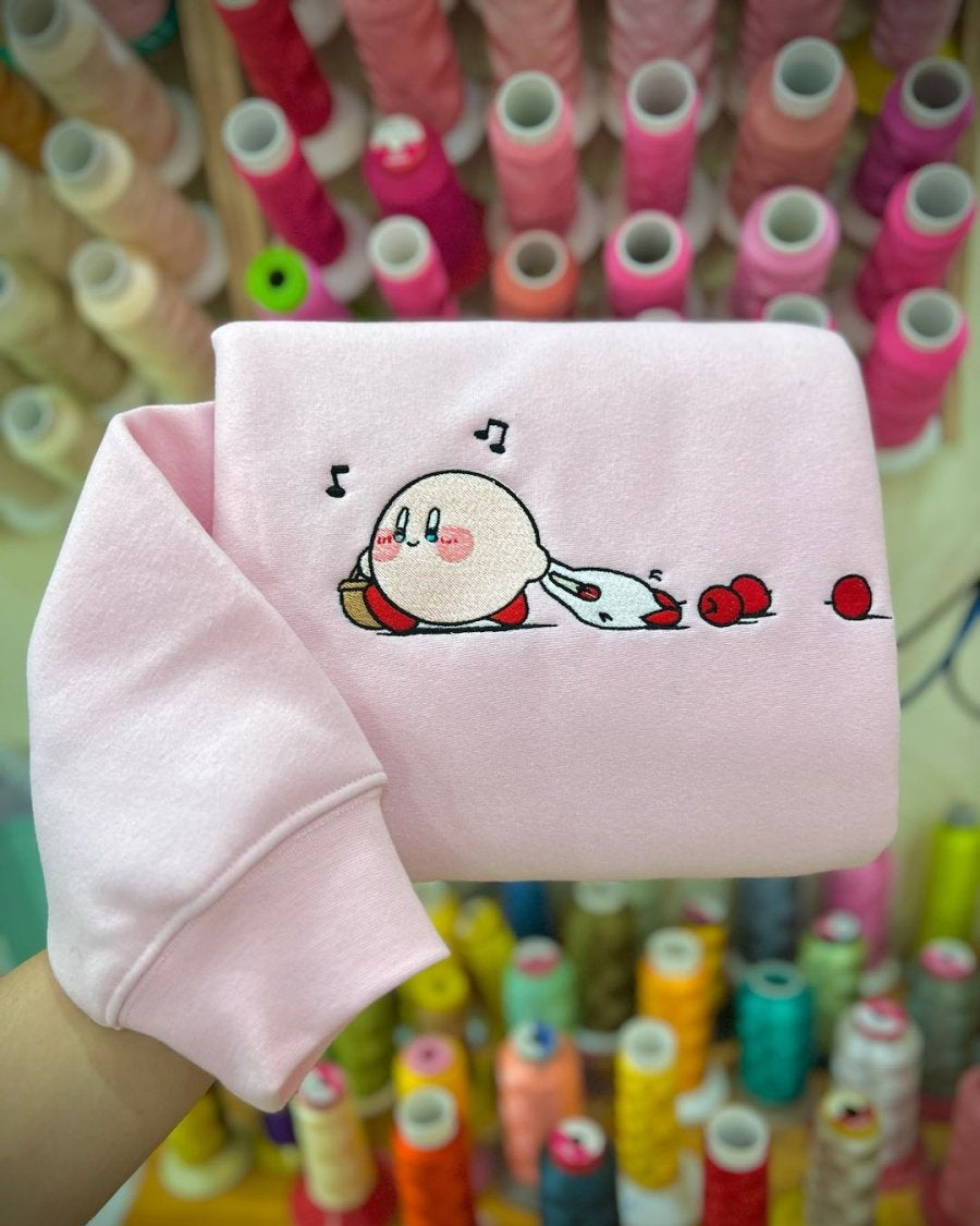 Cute pink Kirby carrying apple basket gaming embroidered vintage crewneck sweatshirt in light pink