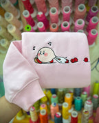 Cute pink Kirby carrying apple basket gaming embroidered vintage crewneck sweatshirt in light pink
