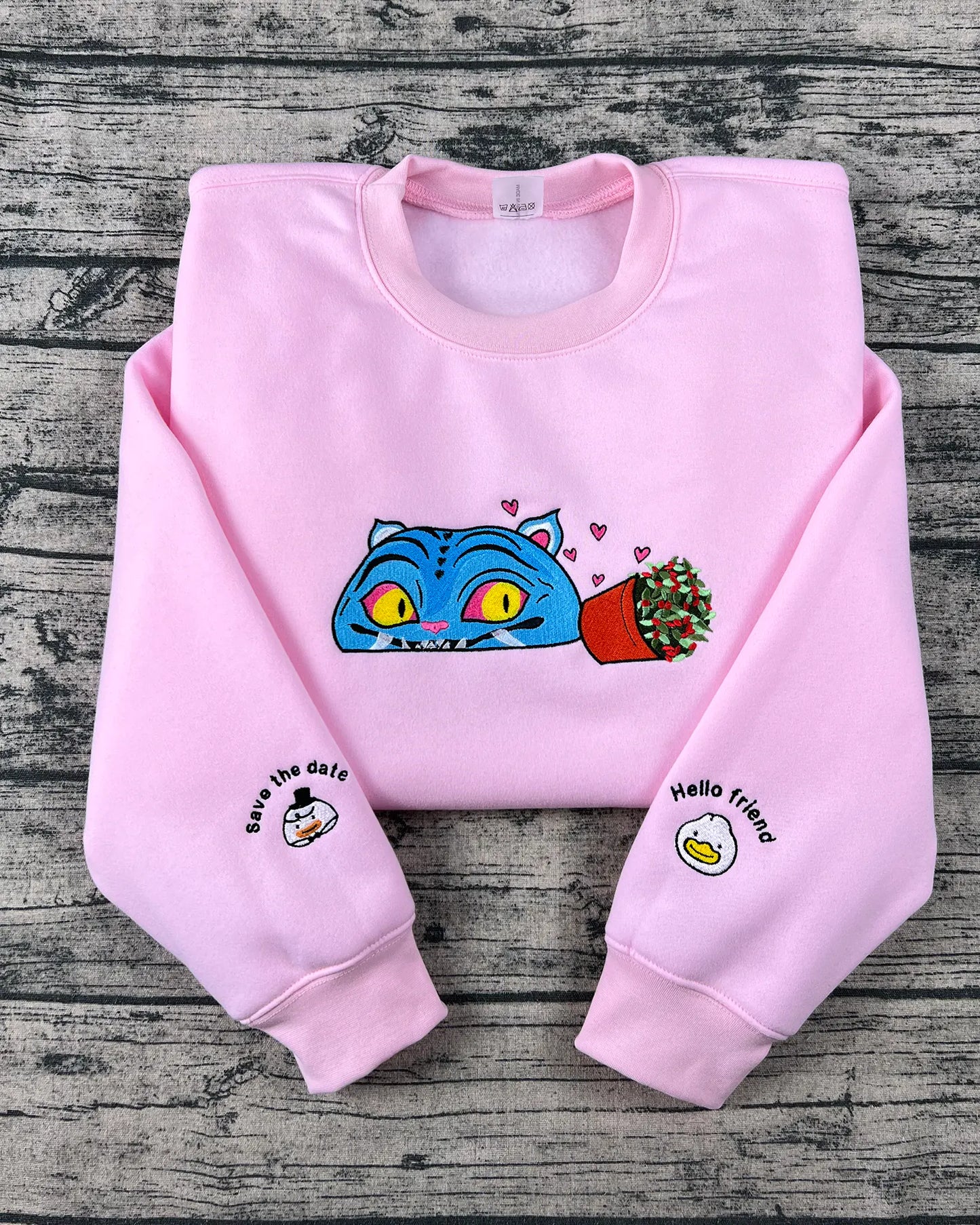 Kpop Hunters tiger embroidered hoodie with derpy demon tiger design. Y2K anime style fan gift for Huntrix and Saja Boys fashion lovers.