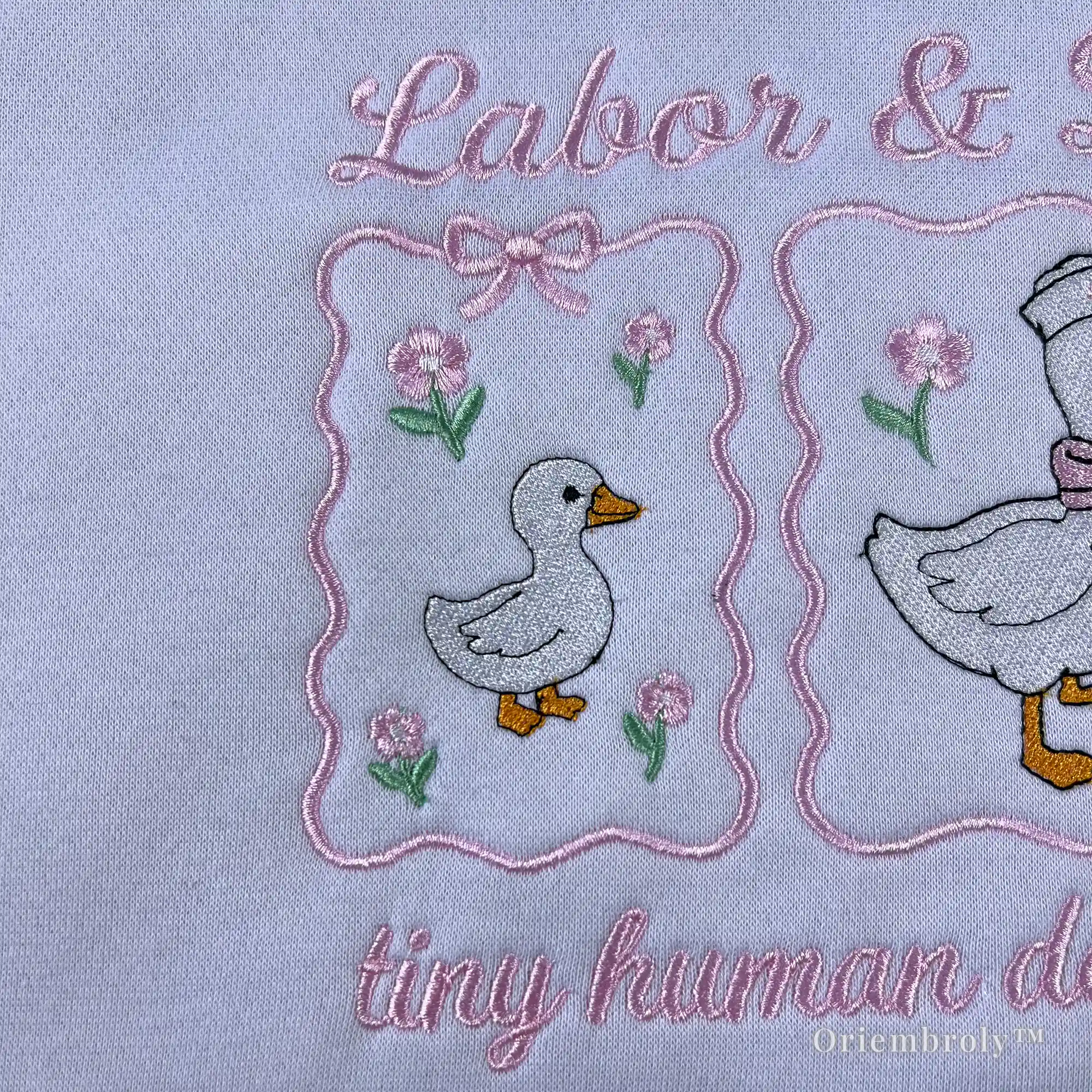 Perfect L&D nurse gift idea: White embroidered sweatshirt with a "baby delivery" goose theme